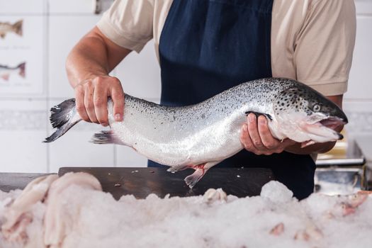 Man holding a pink salmon