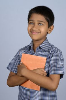 Handsome Indian toddler ready to go to school