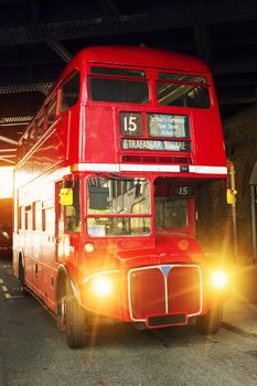 London's iconic Routemaster Bus at sunset