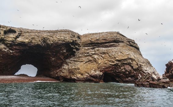 Rocky formation in Islas Ballestas, national reserve, Paracas, Peru