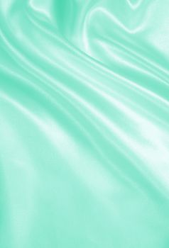 Smooth elegant green silk or satin can use as background 