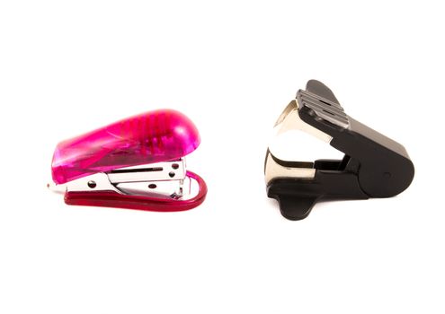 stapler and staple remover isolated on white background
