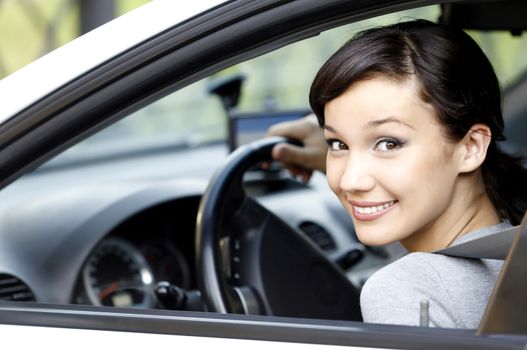 Pretty girl in a car