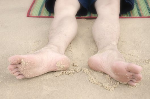 Rest foot on the beach, Summer time