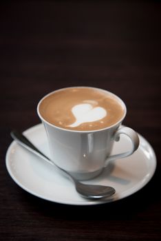 Hot coffee cup with spoon