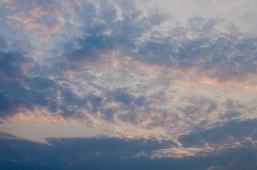 Floating cloud with sunset light in sky