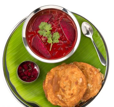 Fried Dough with Beetroot chutney served authentically