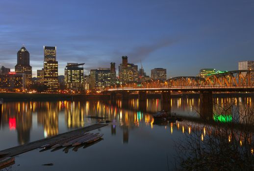 Portland Oregon downtown buildings blue hour lights.