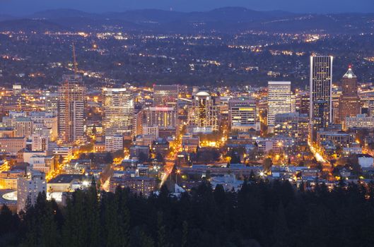 Downtown Portland Oregon city lights blue hour panorama.