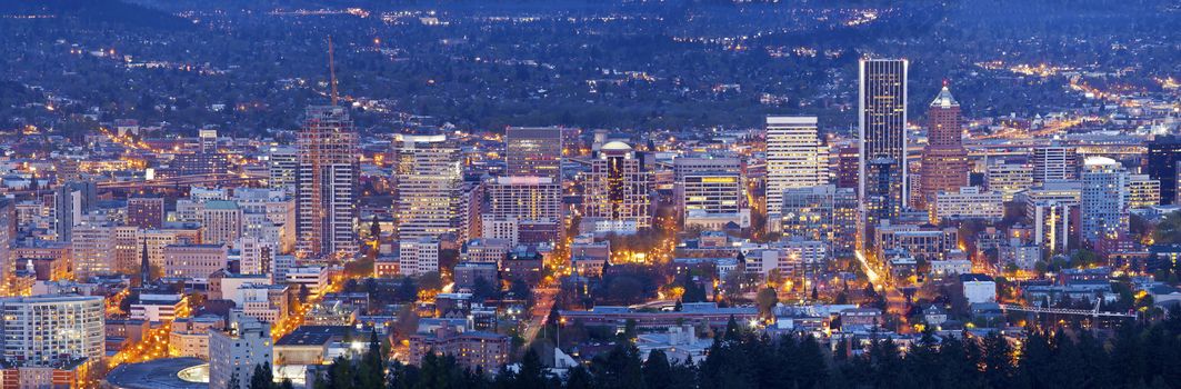 Downtown Portland Oregon city lights blue hour panorama.