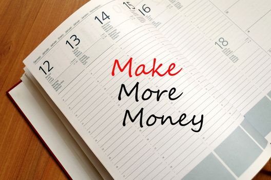 Make More Money Concept Notepad