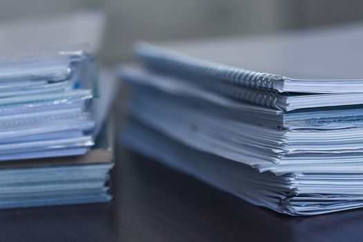 Accounting and taxes. Large pile of magazine and books closeup