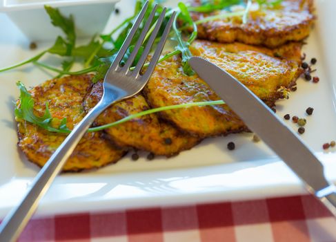 Vegetable fritters with carrots and zucchini. Healthy eating