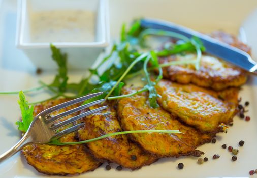 Vegetable fritters with carrots and zucchini. Healthy eating