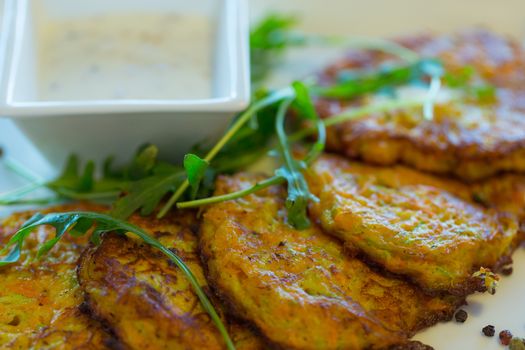 Vegetable fritters with carrots and zucchini. Healthy eating