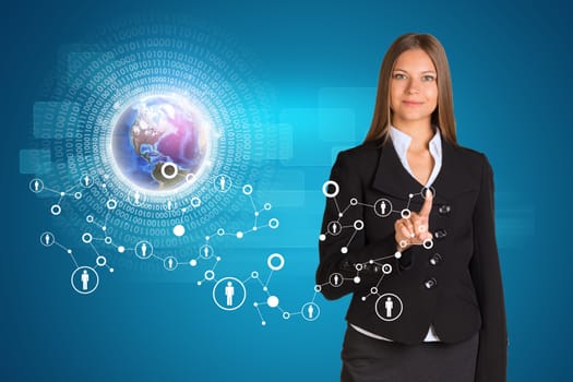 Buinesswoman in suit pressing on holographic screen with connecting lines on world map background. Elements of this image furnished by NASA