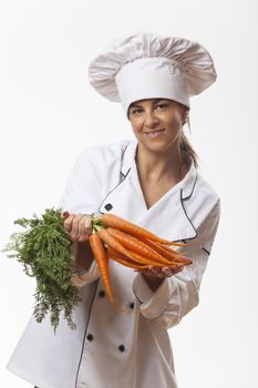 attractive chef with carrots