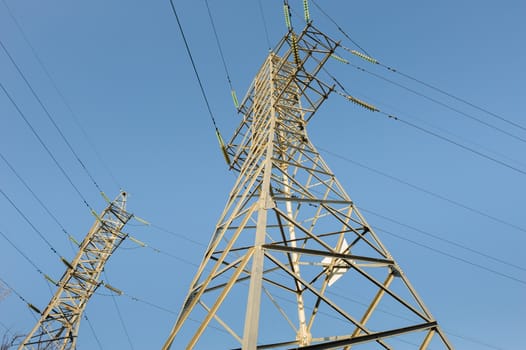 high voltage electric power lines on pylons