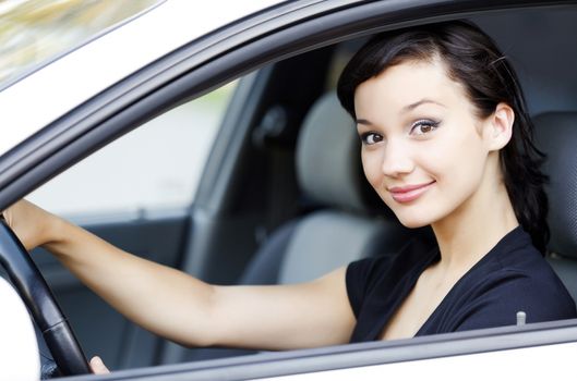 Pretty girl in a car