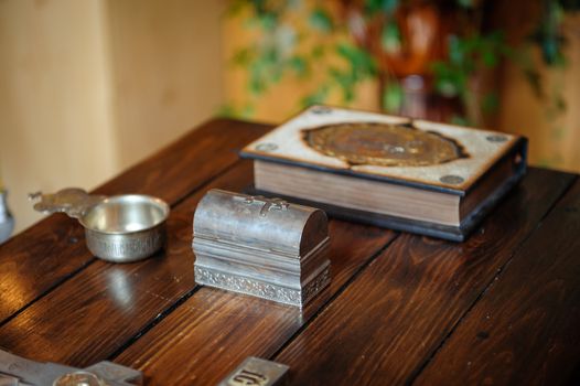 cross and bible on the wooden table.