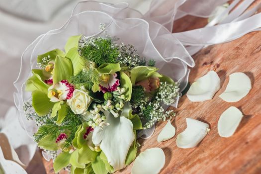 bouquet of flowers on an old wooden base