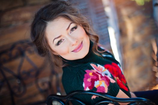 portrait of a beautiful girl in a black sweater