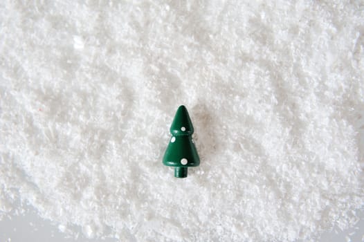 Miniature Christmas Tree on snow