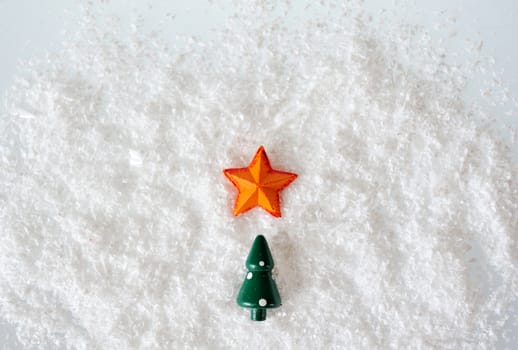 Christmas tree and star on snow