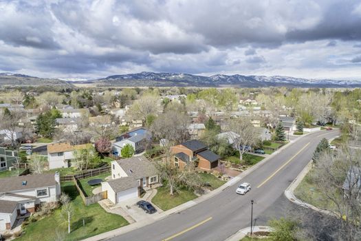 FORT COLLINS, CO, USA - APRIL 18, 2015: Aerial view of Fort Collins, a typical residential neighborhood along Front Range of Rocky Mountains in Colorado,  early spring