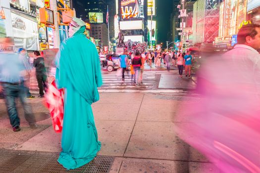 NEW YORK CITY - MAY 22, 2013: Times Square on a spring day. Approximately 330,000 people pass through Times Square daily