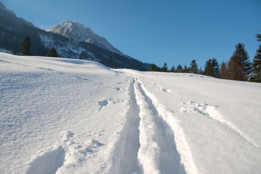 ski slope in powder snow, mountain landscape