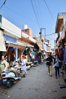 Jodhpur, India - January 1, 2015: Tourist visit traditional village in Jodhpur, India. Jodhpur is the second largest city in the Indian state of Rajasthan with over 1 million habitants.