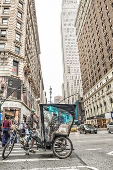 NEW YORK CITY - MAY 22, 2013: Times Square on a spring day. Approximately 330,000 people pass through Times Square daily