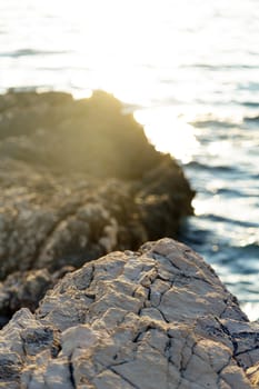 Beach with rocks and clean water closeup