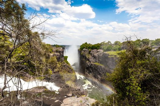 The Victoria falls is the largest curtain of water in the world (1708 meters wide). The falls and the surrounding area is the National Parks and World Heritage Site - Zambia, Zimbabwe 