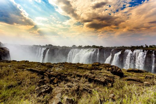 The Victoria falls is the largest curtain of water in the world (1708 meters wide). The falls and the surrounding area is the National Parks and World Heritage Site - Zambia, Zimbabwe 