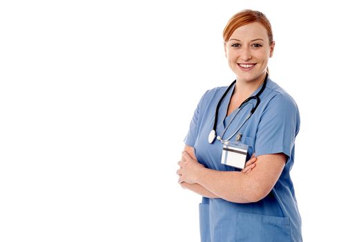 Confident female nurse with welcoming smile