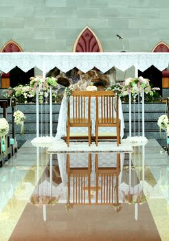 Table set for bride and groom in church