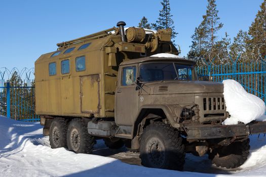 RUSSIA - MARCH 16, 2015: Old soviet off-road vehicle ZIL-131 in the parking lot. Truck terrain produced for the Army from 1966 to 1986.