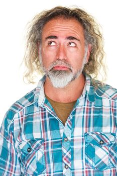 Handsome bored adult with beard looking up