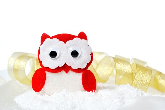 Christmas toy owl and ribbon