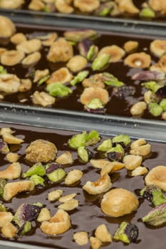 Ingredients for preparation of artisanal chocolate bar with dried fruits
