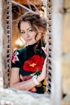 Closeup portrait of beautiful young woman looking at you 