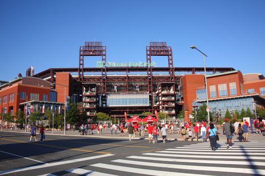 Fans arrive at the Phillies concrete and old fashioned brick ballpark in South Philadelphia sports complex.