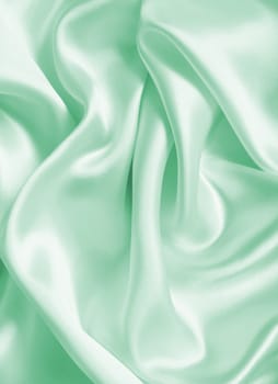Smooth elegant green silk or satin can use as background