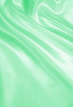 Smooth elegant green silk or satin can use as background 