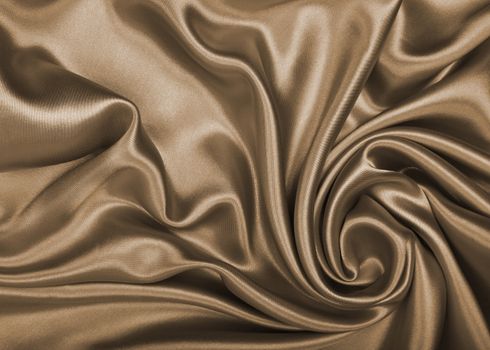 Smooth elegant golden silk or satin can use as wedding background. In Sepia toned. Retro style