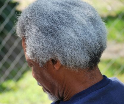 African american male expressions outside alone.