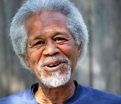 African american male expressions outside alone.