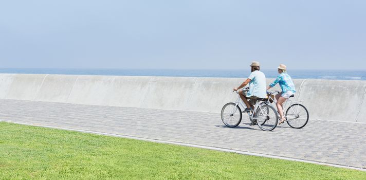 Cute couple on a bike ride on a sunny day